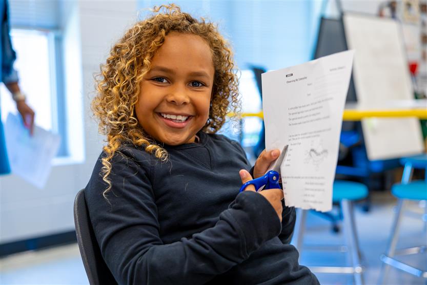 Students smile in science class
